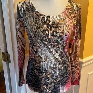 2 light weight print sweaters. First size M second size S